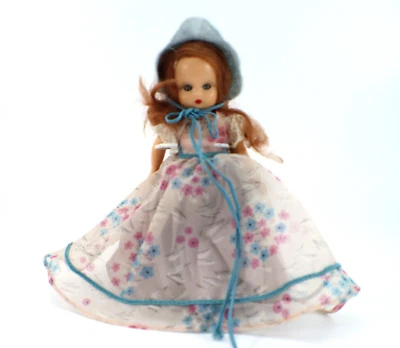 Винтажная кукла Nancy Ann Storybook 5 1⁄2 дюйма красноватые волосы лаванда цветочный узор США - Изображение 1 из 4