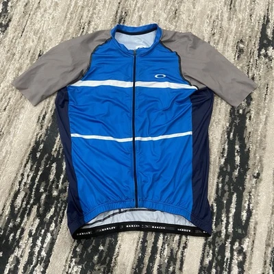 Camiseta de ciclismo Oakley para hombre con cremallera completa trasera 3 bolsillos de equipo talla XXL azul y negro Foto 1 de 4