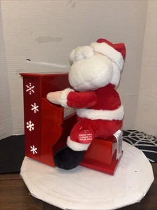 Figura de peluche musical iluminada animada de Papá Noel toca piano villancicos  - Imagen 1 de 10