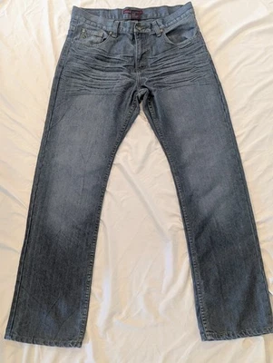 Pantalones de mezclilla de colección Y2K Old Skool metálicos bigotes corte bota talla 32X31 bolsillos bordados Foto 1 de 4