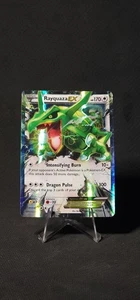 Pokemon Rayquaza EX 75/108 Cieli Ruggenti Holo HP - Foto 1 di 5