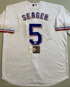 MAGLIA NIKE TEXAS RANGERS- COREY SEAGER AUTOGRAFO HOME WHITE #5 JSA CD81273 - Foto 1 di 5