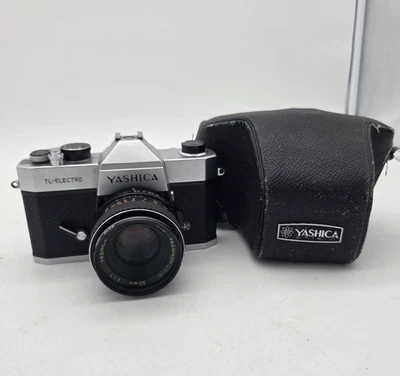Cámara SLR Yashica TL Electro 35 mm con lente Yashinon 50 mm y estuche de cuero COMO ESTÁ Foto 1 de 4