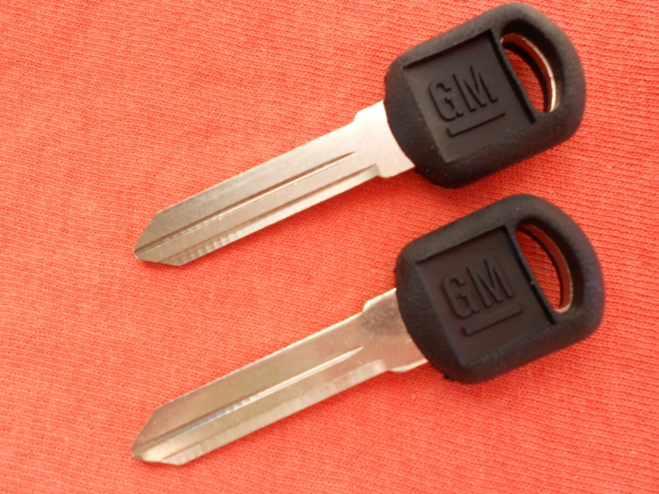 2 PONTIAC GRAND AM OEM KEY BLANKS 1995 1996 1997 1998 - Image 1 of 1