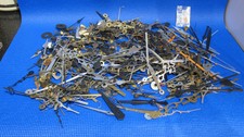 A box with a large quantity of various Clock Hands