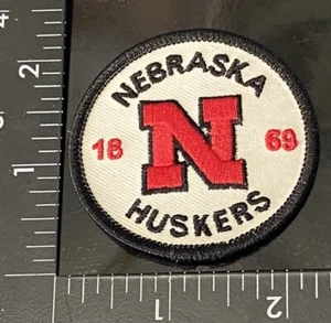 Nebraska Cornhuskers ☝️NCAA Iron On Patch🏈🏀 Redondo - Imagen 1 de 4