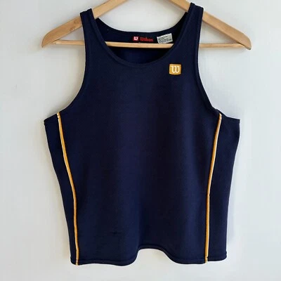 Camiseta sin mangas deportiva Wilson Youth mediana 10/12 poliéster azul marino y amarillo Foto 1 de 4