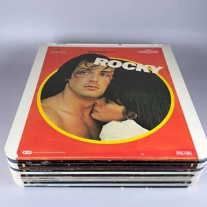VINTAGE FILM VIDEODISCS X12 ROCKY TOM JERRY CHÂTEAUX DE GLACE DÎNER CHAPLIN TARZAN - Photo 1/22