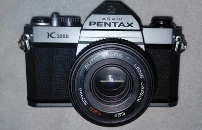 Cámara fotográfica Asahi Pentax K1000 35 mm con lente Sears automática de 50 mm f/2,0. Foto 1 de 4