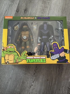 NECA TEENAGE MUTANT NINJA TURTLE MICHELANGELO vs FOOT SOLDIER PAQUETE DE 2 Foto 1 de 2