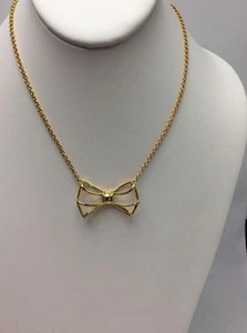 $75 Ted Baker Gold Tone Geometric Bow Pendant A203 - Picture 1 of 10