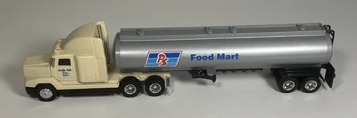 Remolque cisterna de petróleo popular Ertl 1/64 diecast Freightliner PS Food Mart Foto 1 de 4