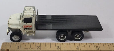 Camión de plataforma EPW Implement Company blanco internacional granja Ertl raro de colección Foto 1 de 4