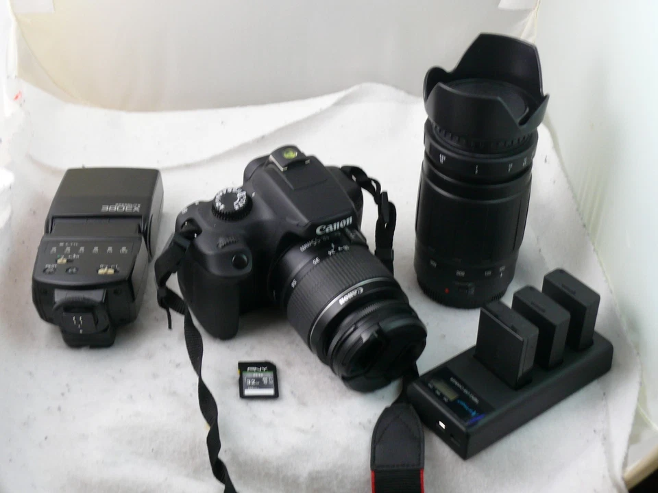 Canon EOS 4000D 2 OBJETIVOS 18-55MM TAMRON 100-300MM PAQUETE LIMPIO ESTUCHE WIFI 32 GB Foto 1 de 4