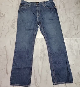 Pantalones de mezclilla Ariat M4 FR para hombre 36X34 azul corte bota relajado rodeo Western CAT 2 - Imagen 1 de 14