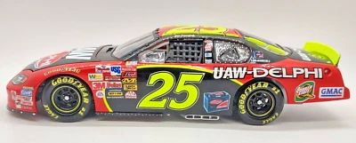 Joe Nemechek 2003 UAW-Delphi Monte Carlo Car/Bank 1:24 scale NASCAR Diecast - Image 1 of 4