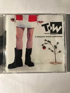 A Tragikly White Christmas Cd - Foto 1 di 2