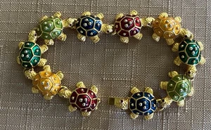 GORGEOUS 7-1/2" GOLDTONE 10 TURTLES BRACELET (988) - Picture 1 of 5