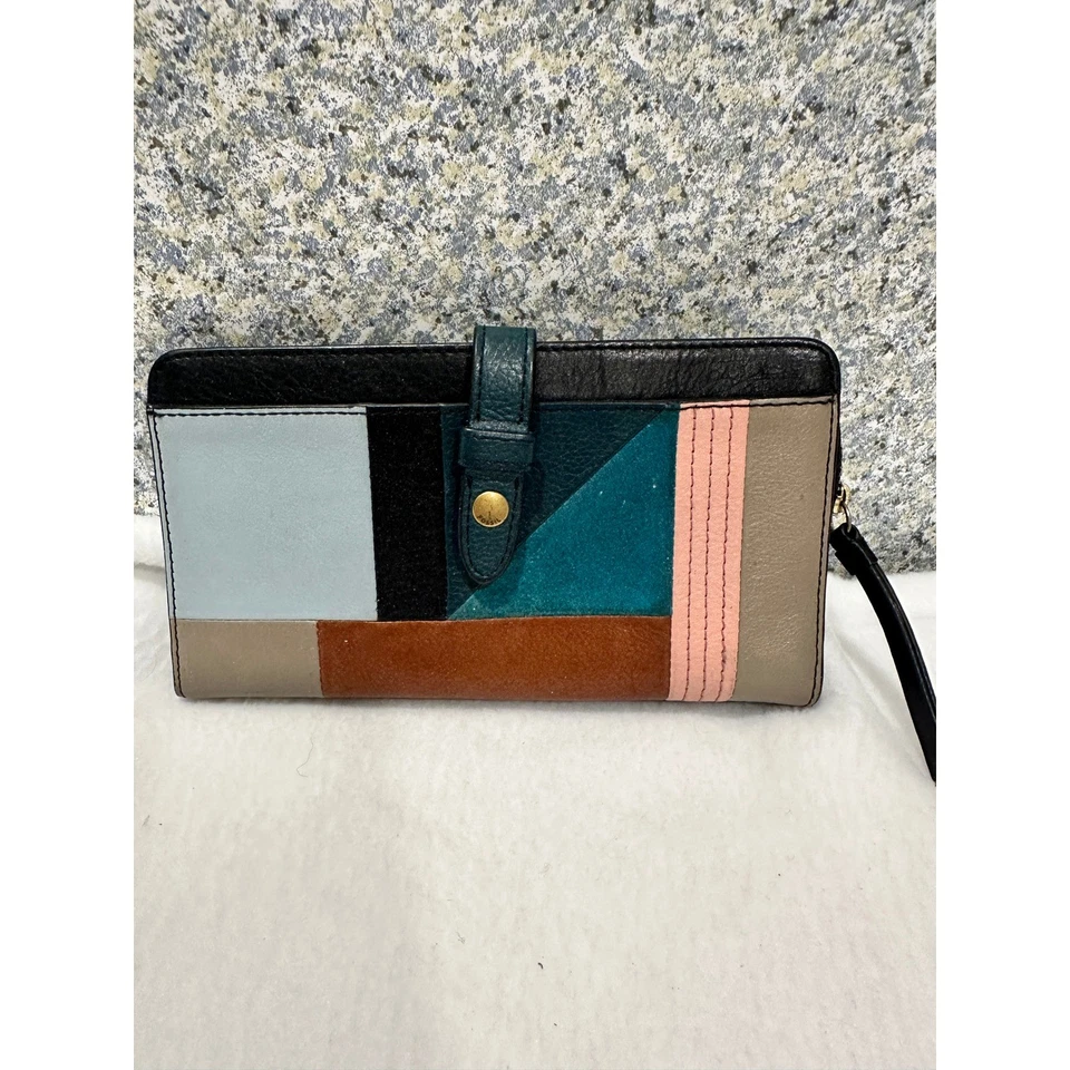 Cartera clutch fósil retazos cuero muñeca cremallera alrededor Foto 1 de 4