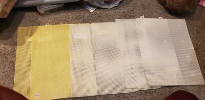 5 white & 2 yellow Darice-Quick Count 10.5" x 13.5"  Plastic Canvas Sheets  - Image 1 of 2