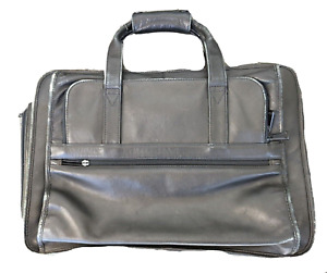 Black leather soft sided used multi compartment brief case, Winn International