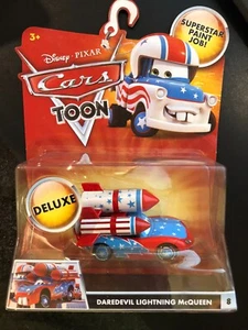 Disney Pixar Cars Toon Deluxe - Daredevil Lightning McQueen # 8 Mater The Great - Picture 1 of 3