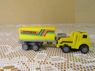 661Y Giocattolo Micro Camion Porta Container Espresso Giallo L 8 Cm - Immagine 1 di 4