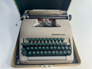 Macchina da scrivere portatile Smith Corona Clipper con custodia testata funziona vintage - Foto 1 di 14