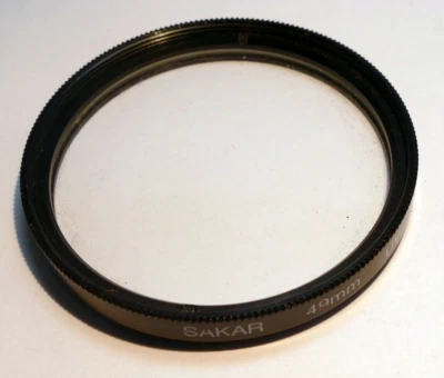 Sakar 49mm Lens Filter UV protection threaded screw in type - Image 1 of 4