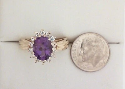 Anillo de dama 14k Y/G y 14 diamantes .30tcw y amatista,, talla 9, peso 4,9 gramos Foto 1 de 3