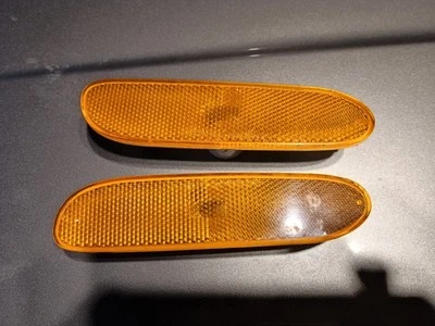 Par de lentes marcadores delanteros de neón Dodge 2000-05 OEM Foto 1 de 4