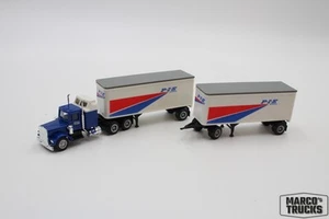 Herpa Kenworth W900 Roadtrain with zwei Trailer „PIE Nationwide“ 1:87 /H20877 - Picture 1 of 1