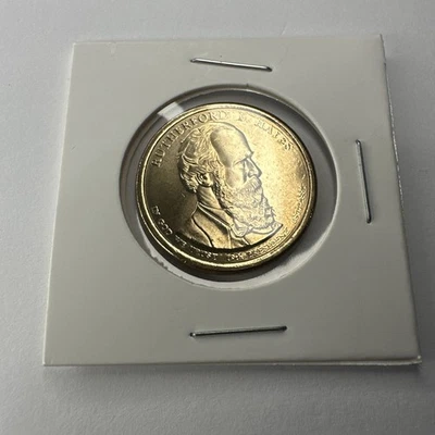 Moneda de dólar presidencial Rutherford B. Hayes 2011-D Foto 1 de 2