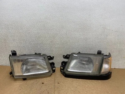 1999 - 2000 Subaru Forester Left+Right Side Headlights OEM V3490 DW - Image 1 of 4