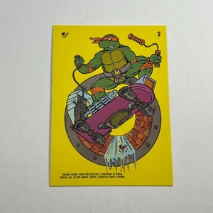1989 Topps TMNT Teenage Mutant Ninja Turtles #9 Miguel Ángel Skateboarding - Imagen 1 de 2