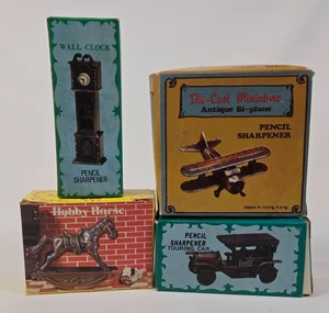 Menge 4 Vintage Druckguss Bleistiftspitzer mit Boxen - Uhr Auto Flugzeug Pferd - Bild 1 von 15