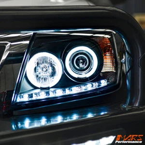 Black DRL LED CCFL Angel-Eyes Projector Head Lights for Toyota Hilux VIGO 11-15 - Picture 1 of 9