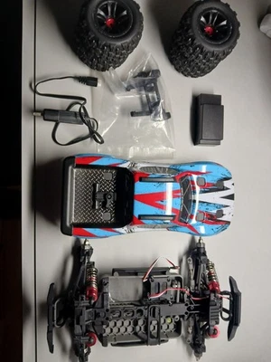 Rolo Mjx 16208 com bateria e carregador 2s, 4 pneus, barra Wheelie - Imagem 1 de 4