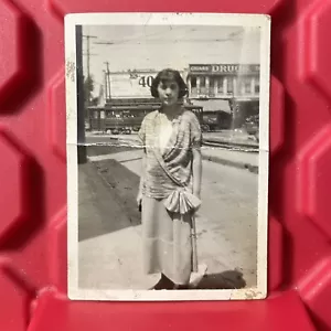 Woman Posing By A Drug Store Photograph 2 7/16 x 3 7/16 Pre Owned Vtg 1920s - Picture 1 of 3