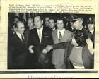 1972 Press Photo Supporter of Juan Peron grabs his wrist at airport - now44498