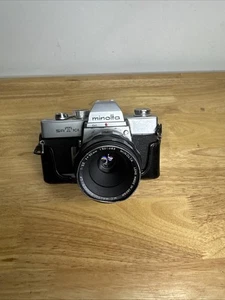 Cámara fotográfica vintage Minolta SRT 101 SLR con lente Rokkor 58 mm piezas reparación - Imagen 1 de 5