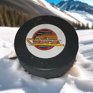 VANCOUVER CANUCKS NHL VINTAGE JOHN A. ZIEGLER TRENCH MFG. GAME PUCK MADE🇨🇦 - Picture 1 of 12