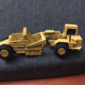 ERTL MIGHTY MOVERS CAT CATERPILLAR 613C ELEVATING SCRAPER DIECAST 1:64 - Picture 1 of 3