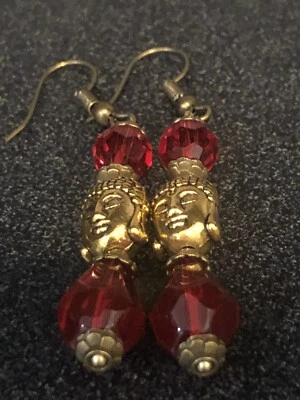 Hermosos pendientes de oro Buda de cristal rojo para mujer Foto 1 de 2