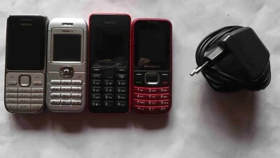 4 Handy 3 NOKIA 1 SWISS ONE 1  und ein Netzteil - Bild 1 von 4