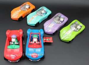 Distributore di caramelle/auto da corsa in plastica vintage Galarie sigillato SNOOPY (lotto di 6) - Foto 1 di 11