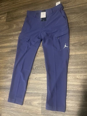 Calça Nike Air Jordan Golf Repel tecido fina roxa DZ0542-502 masculina tamanho 32 x 32 - Imagem 1 de 4