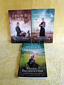 NEW - SHELF WEAR, 3 BOOK AMISH GREENHOUSE MYSTERY SERIES BY WANDA E. BRUNSTETTER - Imagen 1 de 18