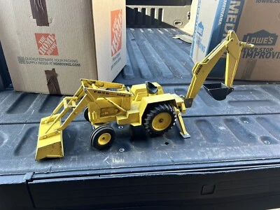 Retroexcavadora tractor Ertl Ford 5550 de colección escala 1/12 construcción diecast Foto 1 de 4