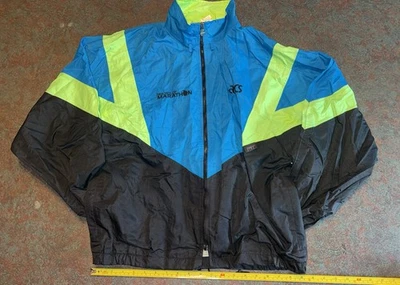 Chaqueta cortavientos grande vintage años 90 Asics New York Marathon amarillo neón y azul Foto 1 de 4